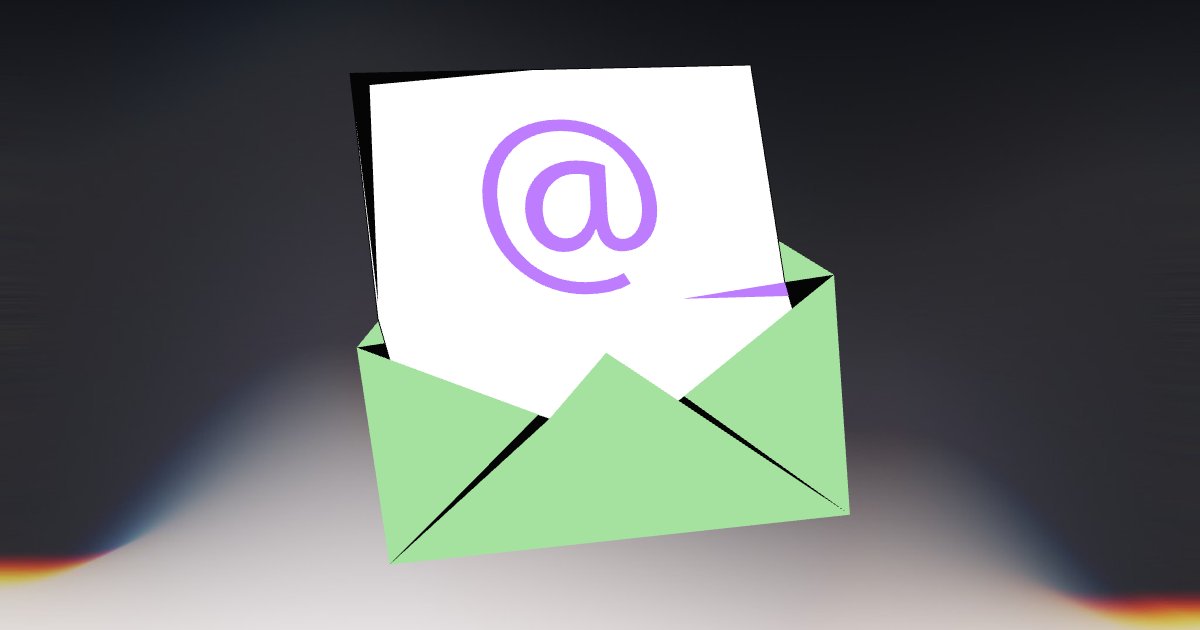 Open mint envelope with a white card and purple @ symbol on a soft abstract background